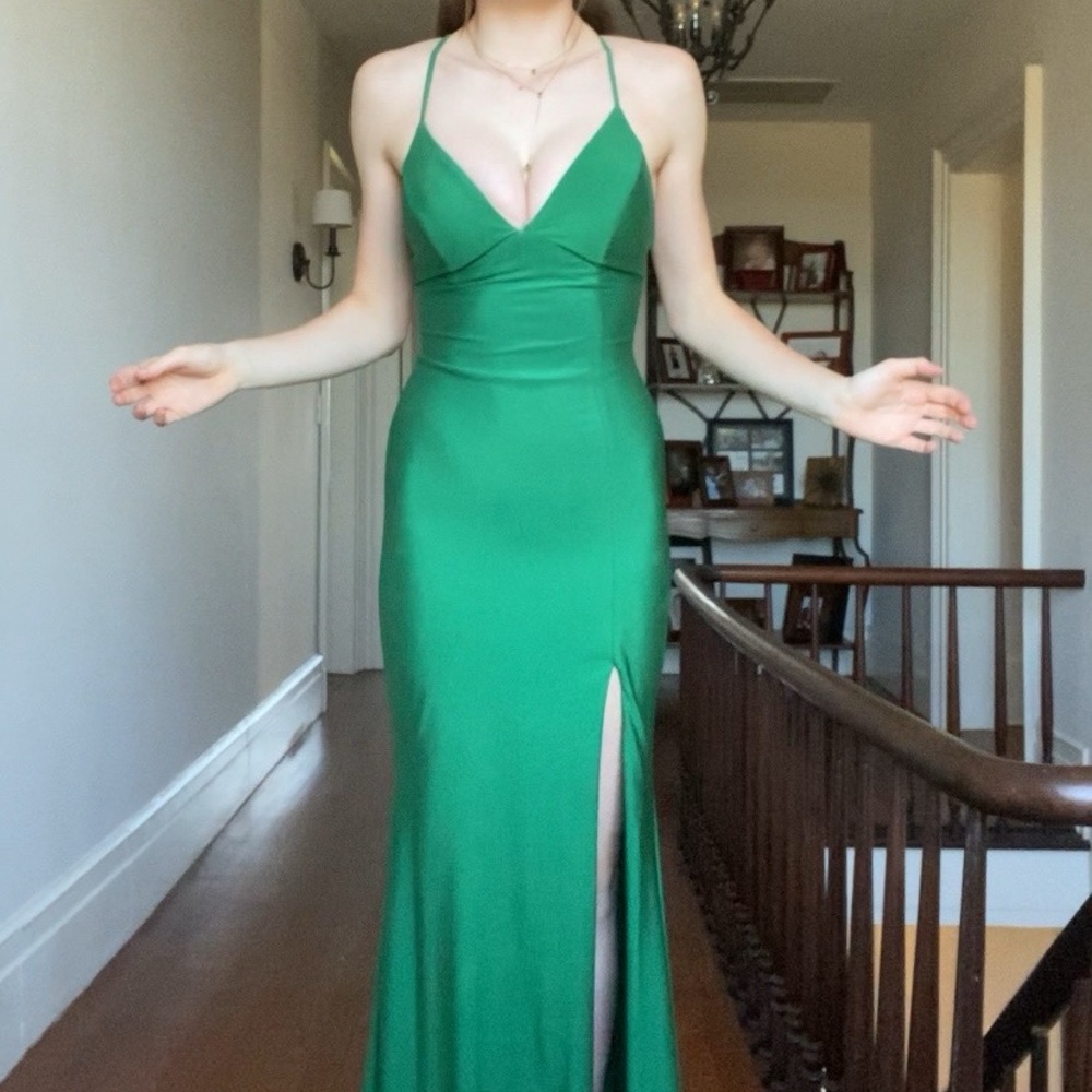 FAVIANA green prom dress worn once- basically brand new. Selling for cheap price